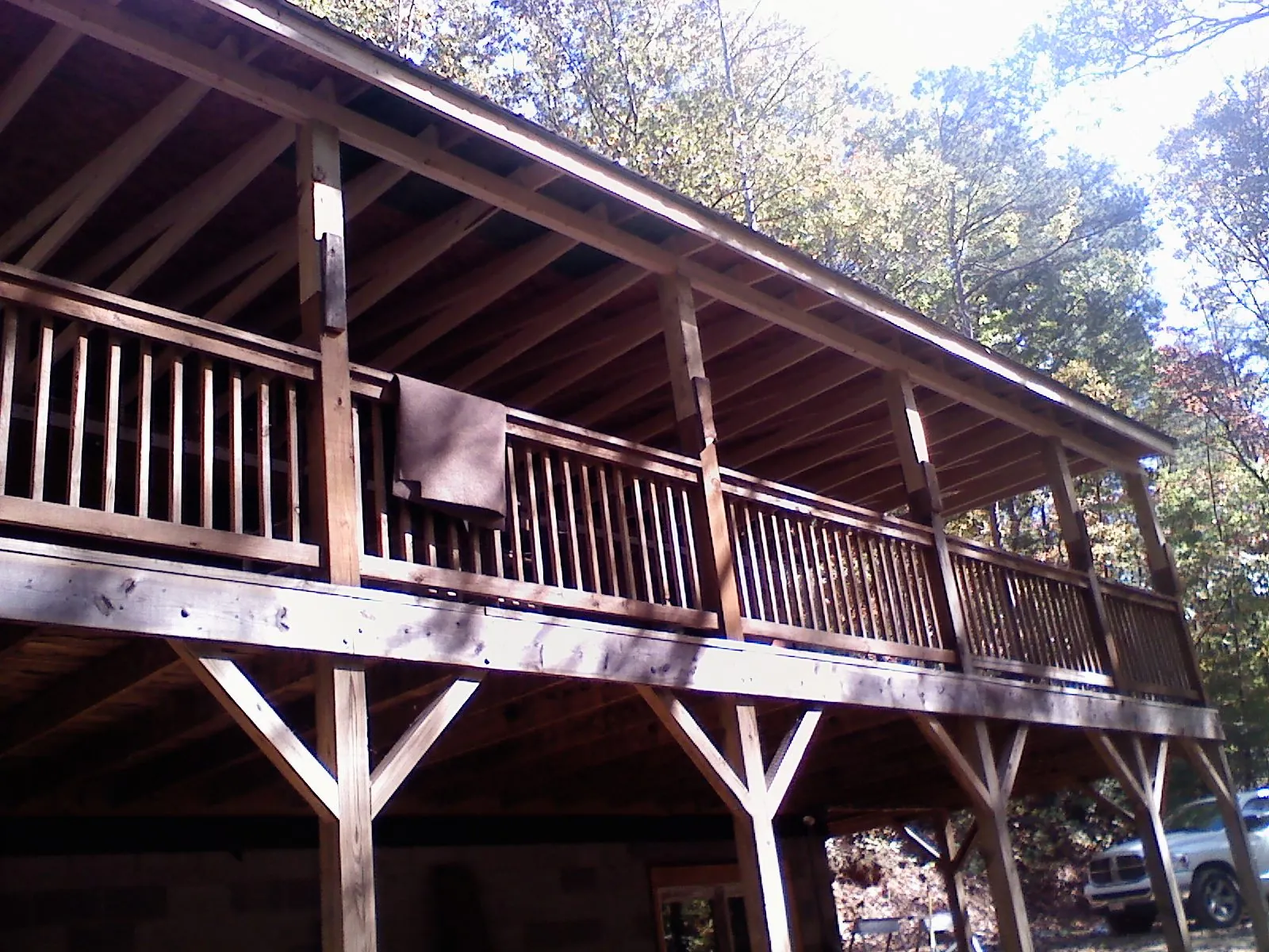 Timber framing under a new elevated porch and deck — Roof Leak Repair in Far Hills by Roofing Brothers